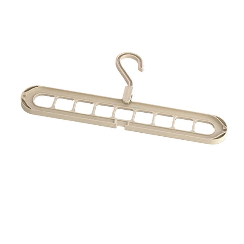 A plastic nine-hole seamless folding hanger for trousers, shown in one of five available colours.