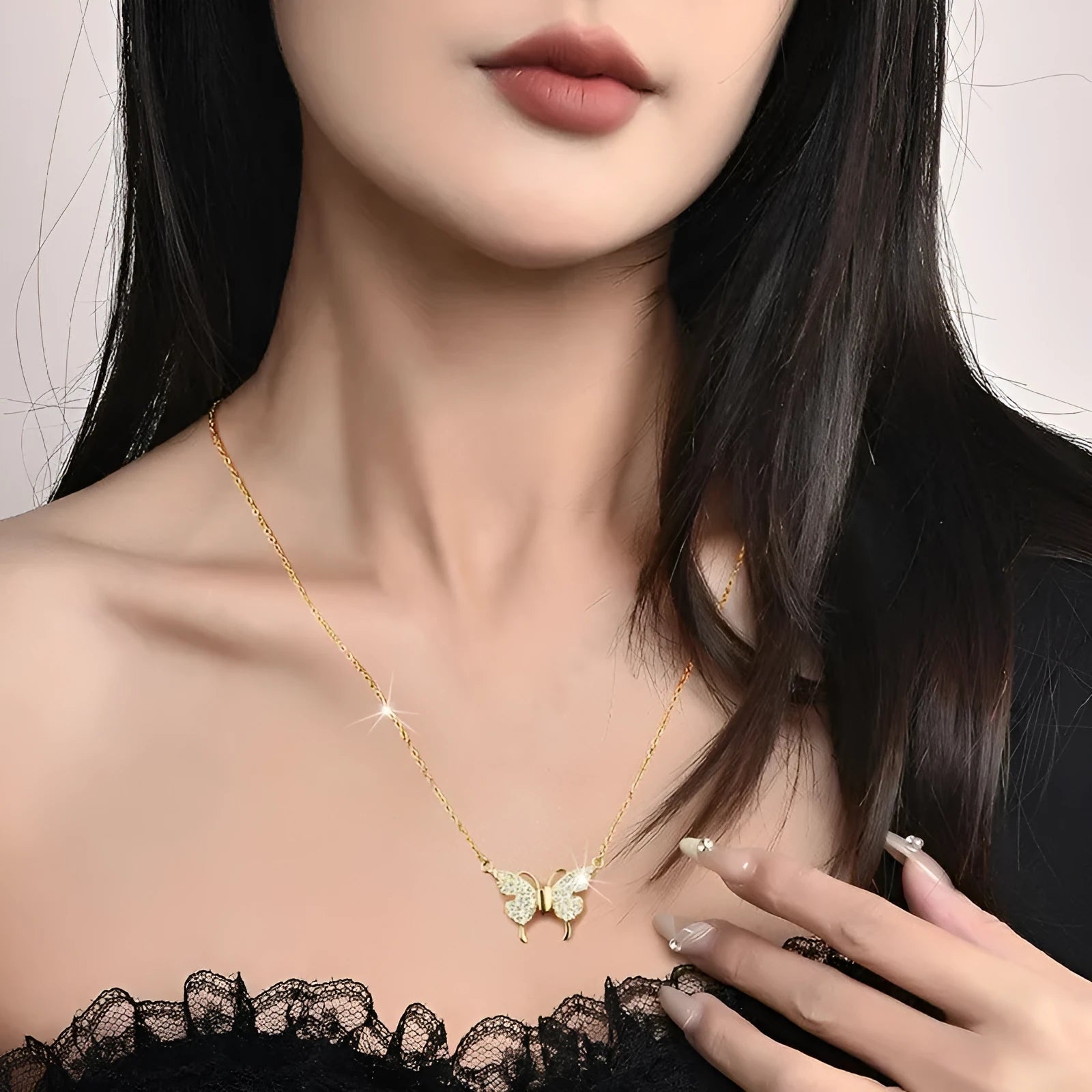 Gold clavicle chain necklace with magnetic butterfly charm and twisted chain design