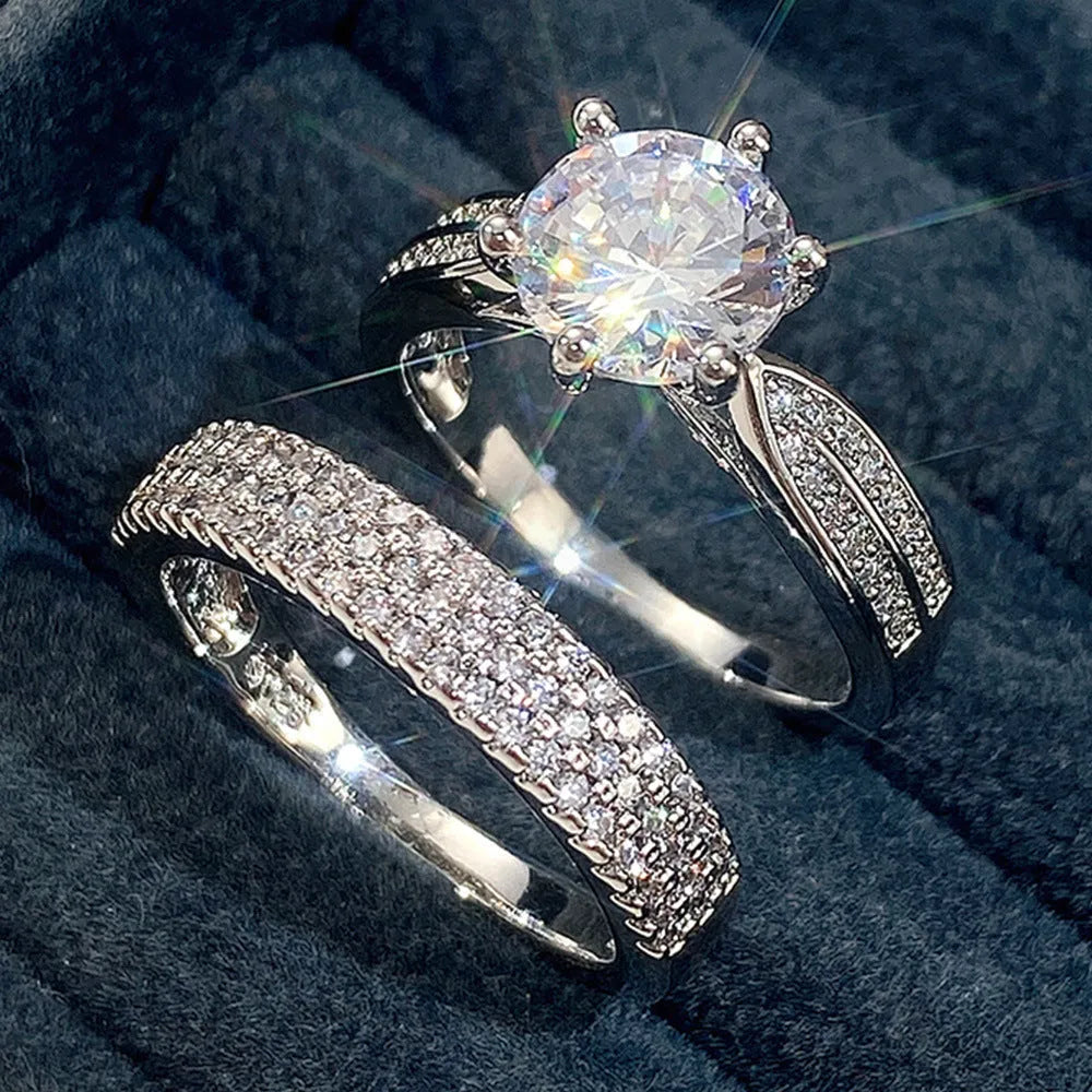 White gold colour combined ring and bracelet jewellery with geometric shape and round elements