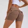 Women's high waist fitness shorts with pockets in avocado green colour for yoga and workouts