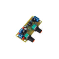 Front stage bass boost circuit board with components mounted on FR-4 fibreglass showing mounting holes and connections