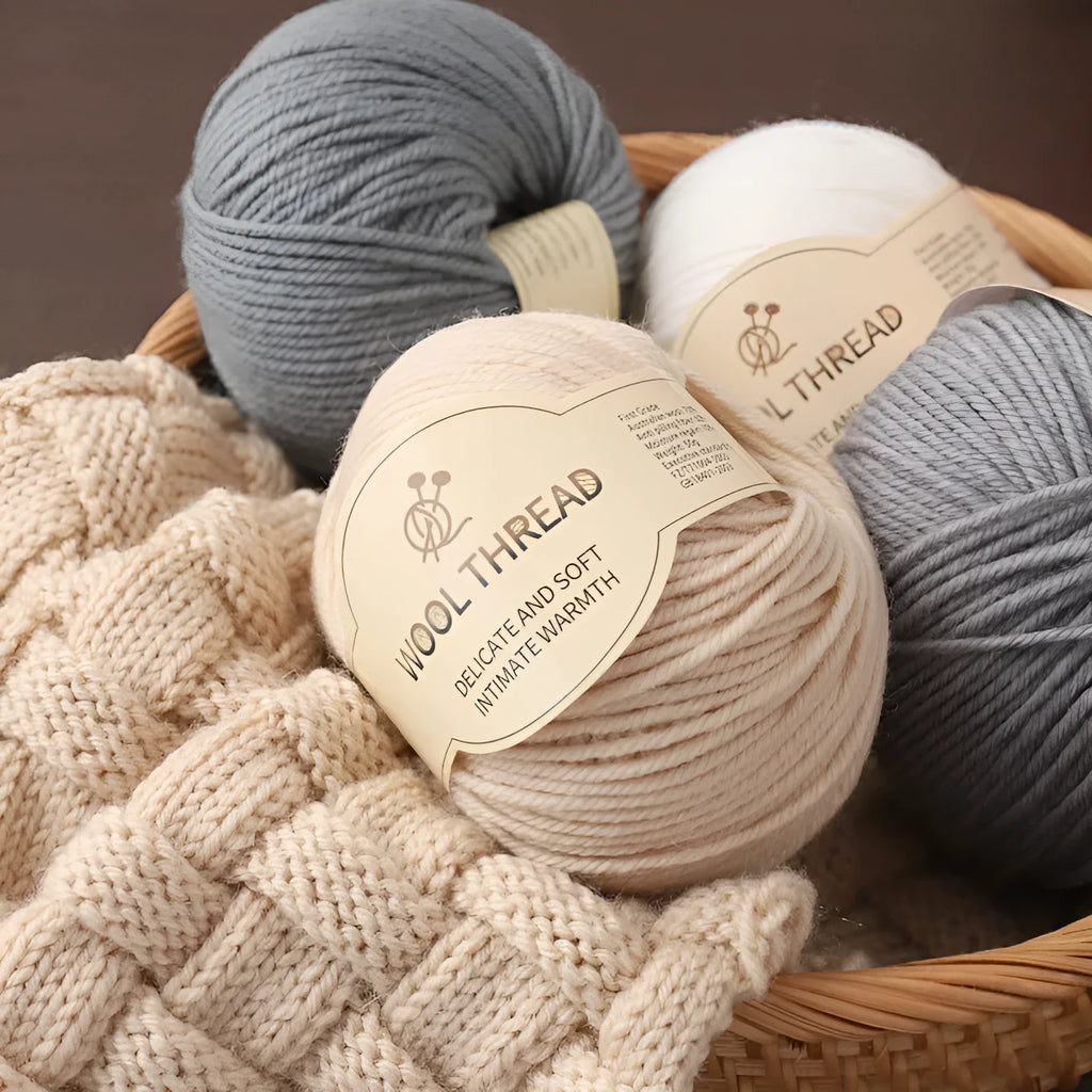 Hand-knitting wool thread in multiple colours for baby garments on size 10 needles