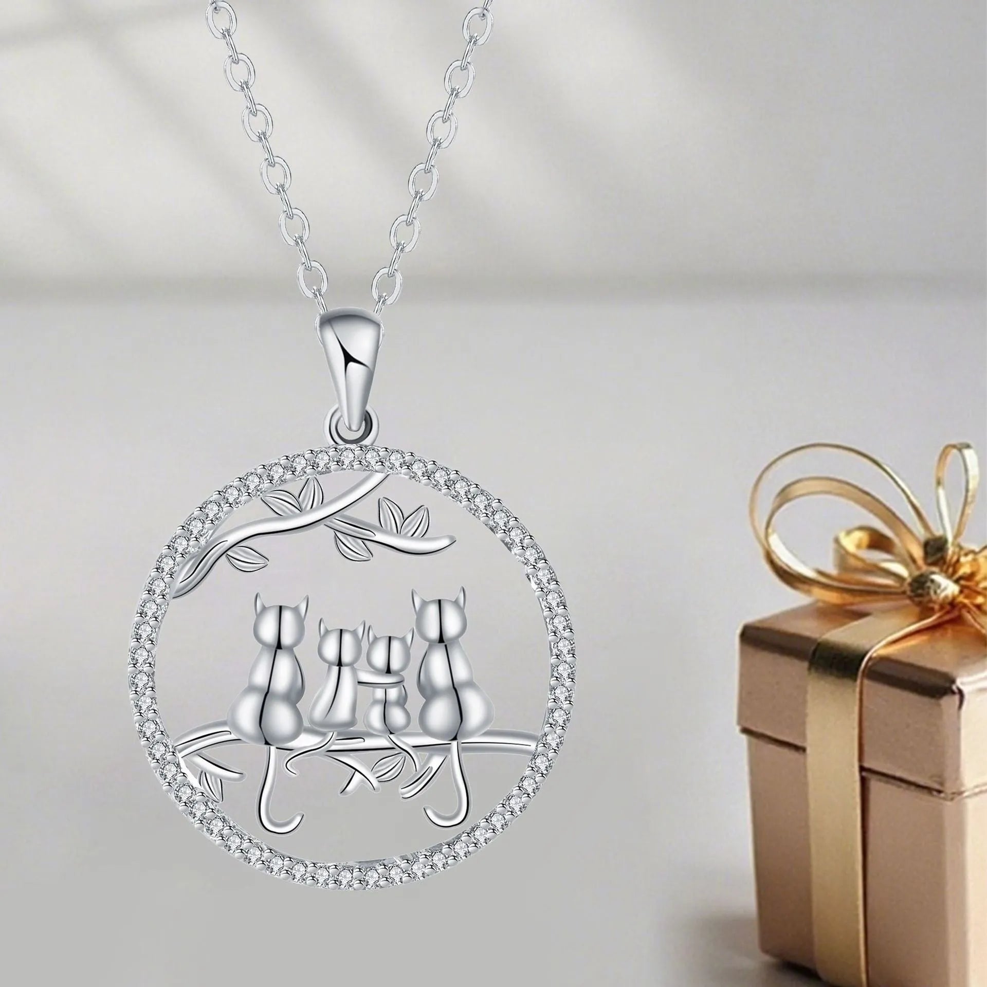 Copper necklace with four kitten pendant and cross chain style