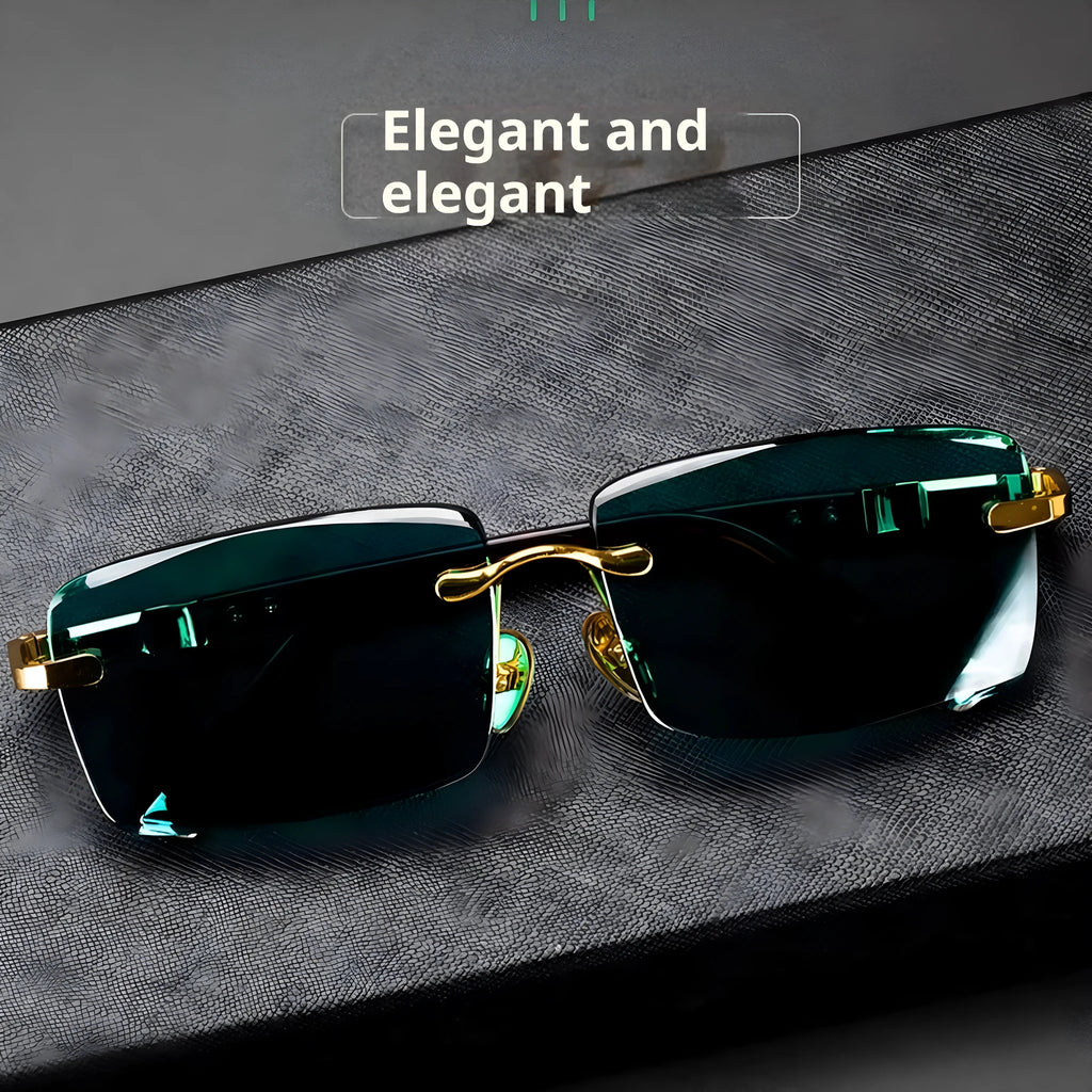Dark green frameless crystal sunglasses with a glasses case and cleaning cloth.