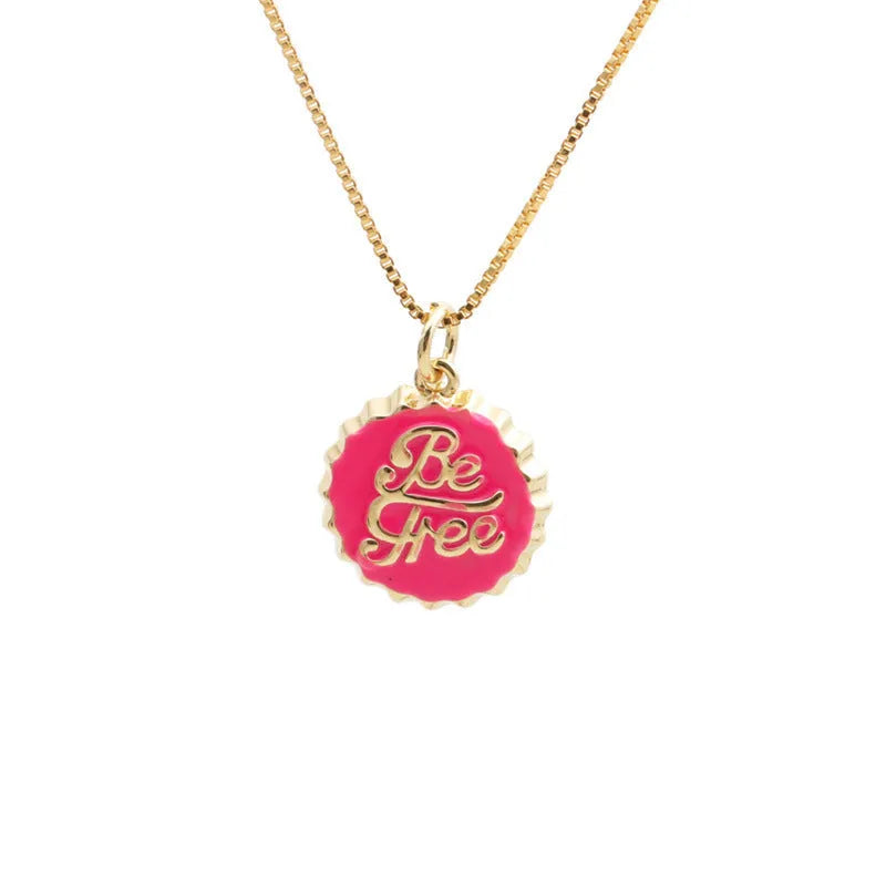 Copper bottle cap pendant necklace with gold plating on a box chain.