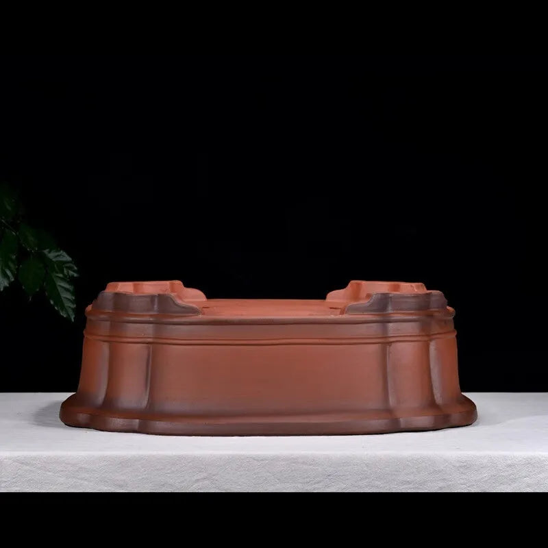 Antique jade Chinese style purple clay flowerpot with golden marble patterning, oval shape, 71cm long.