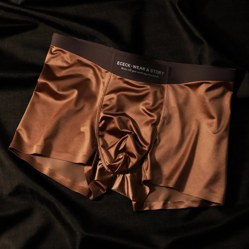 Men's colourblock ice silk seamless underwear in blue, brown, grey, and white colour options.