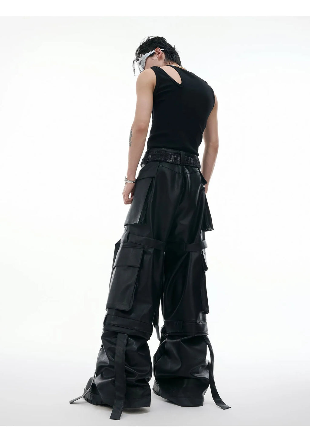 Black loose-fit retro trousers with quilted stitching and multiple pockets