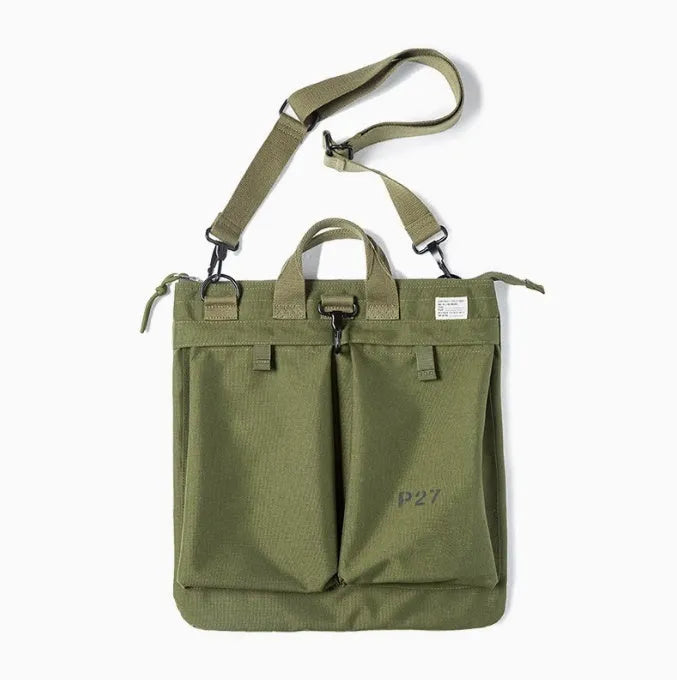Canvas crossbody shoulder bag in military green with phone pocket and space for 15-inch laptop