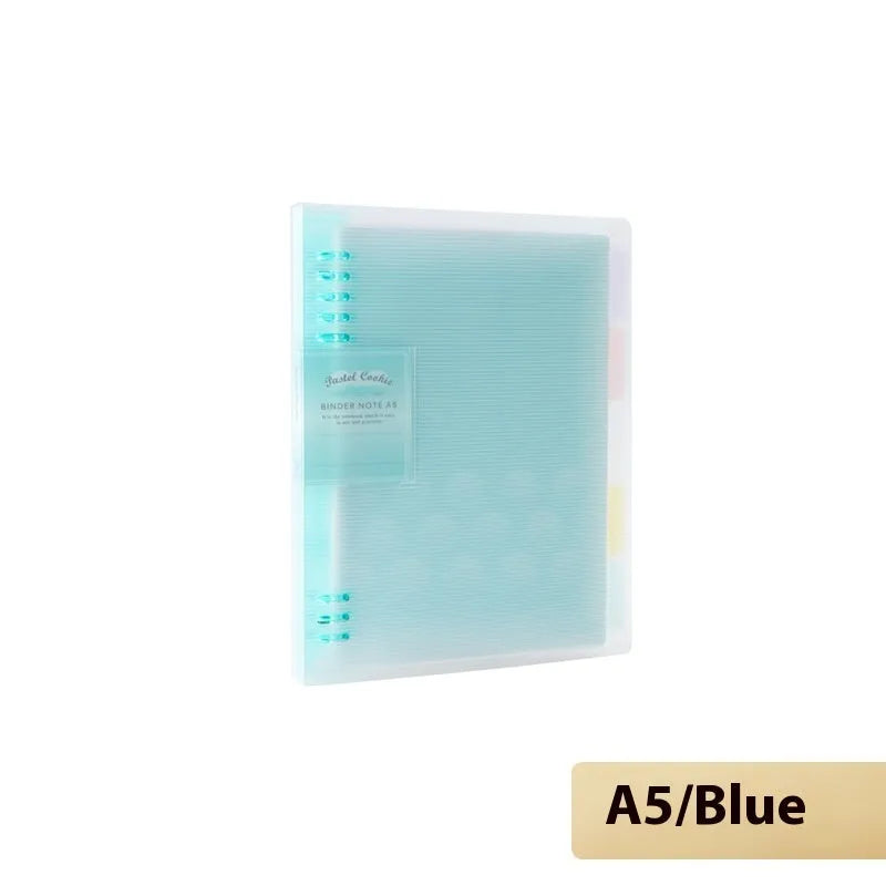 Refillable loose-leaf spiral notebook with PP cover open, showing raw wood pulp paper in grid ruling.
