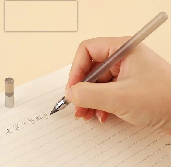 Clear acrylic eternal pencil with alloy pen head showing internal mechanism and colour refill options