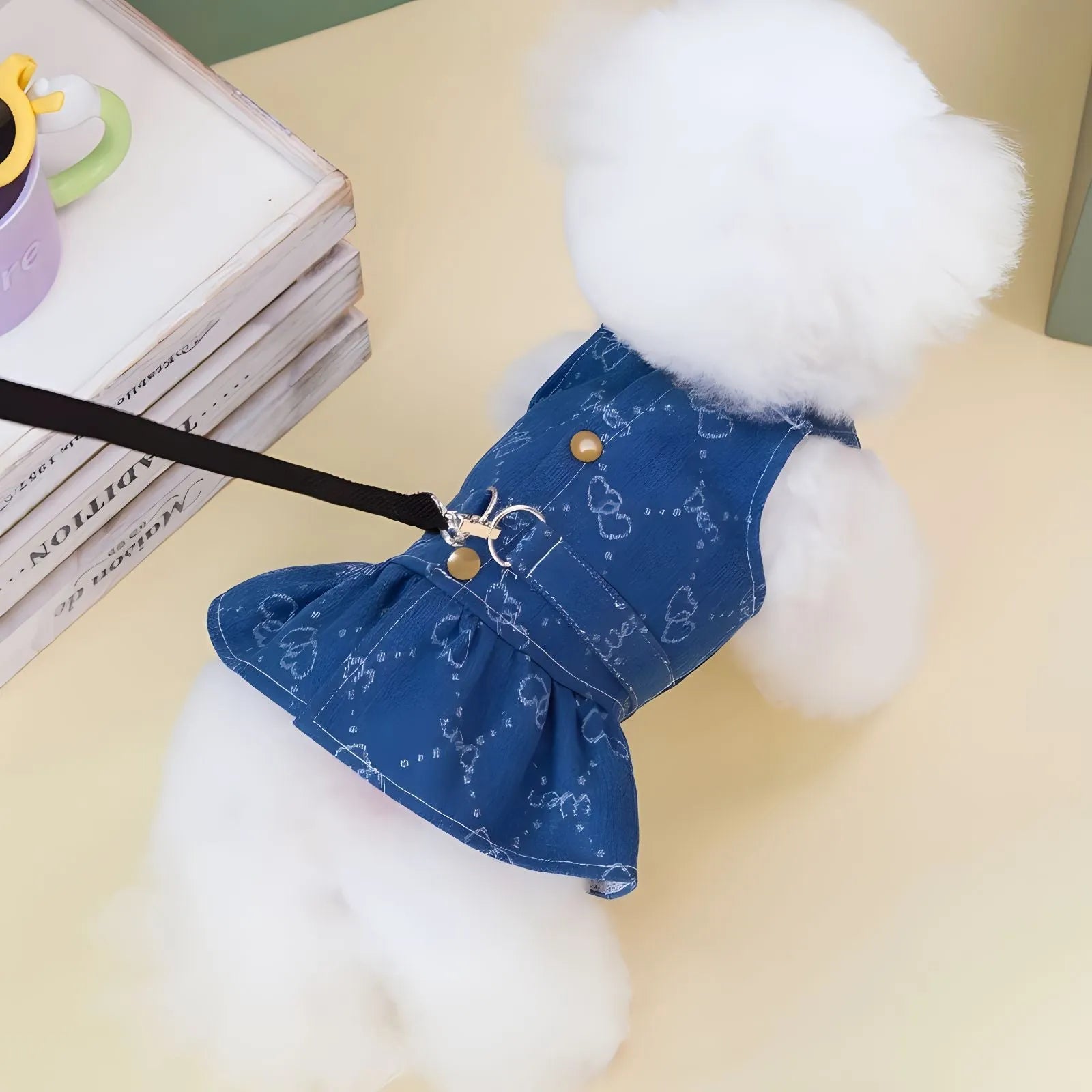 Denim princess dress for small dog on hanger showing bracket skirt style