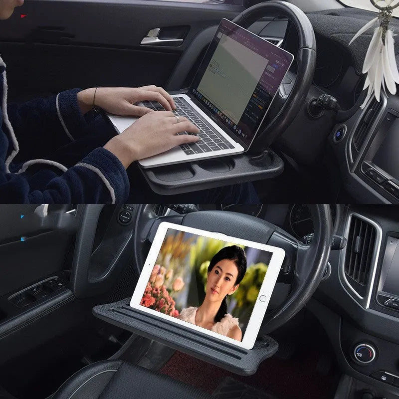 Black plastic car tray desk measuring 42cm by 28cm on a car seat