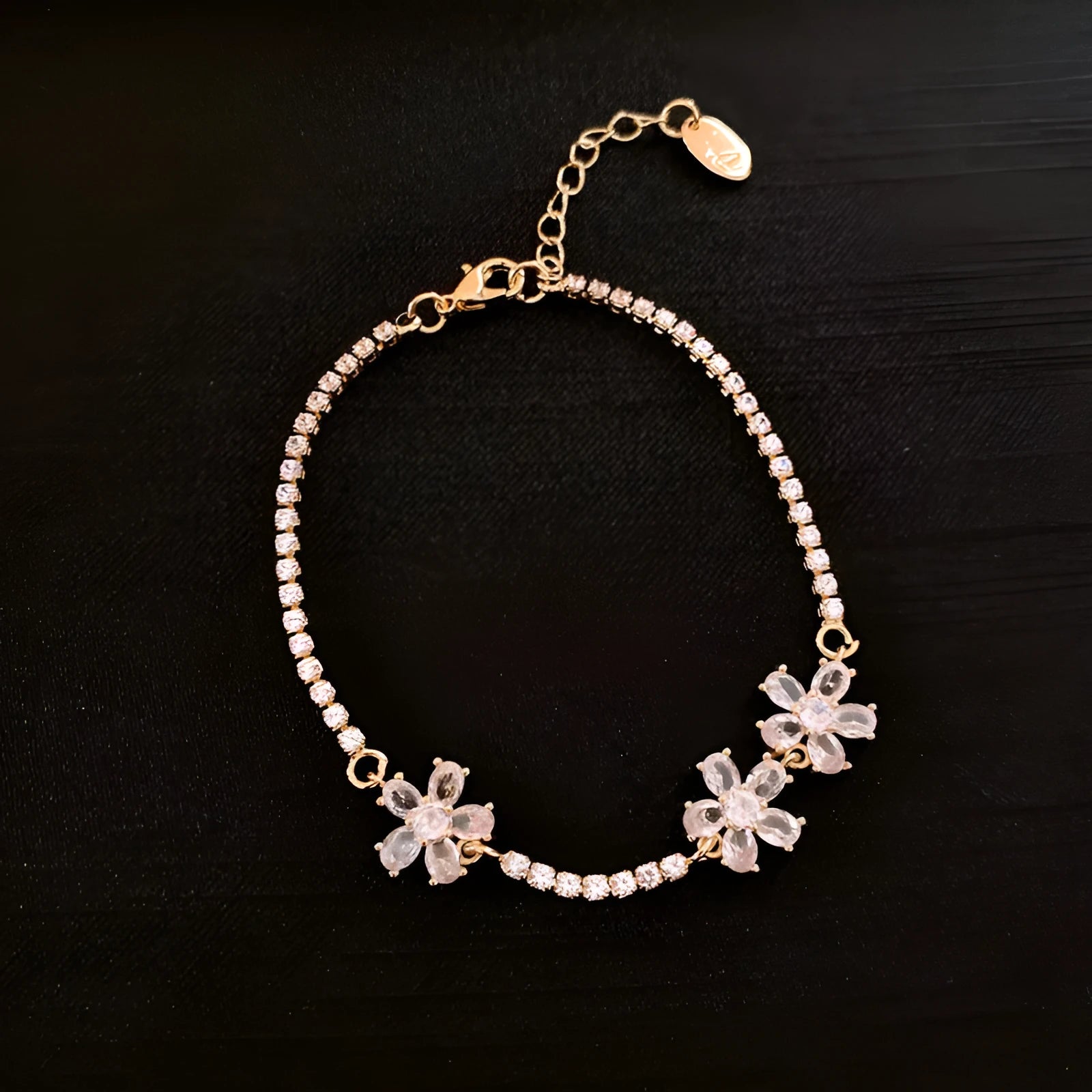 Gold-tone copper bracelet with geometric design and inlaid zircon stones for women