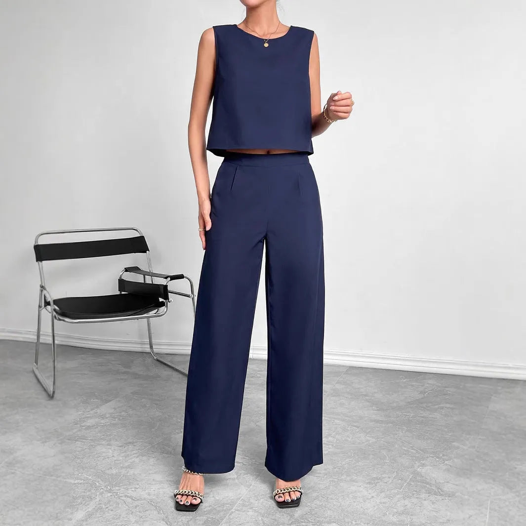 Women's red polyester two-piece set showing sleeveless round neck top with wide leg pants