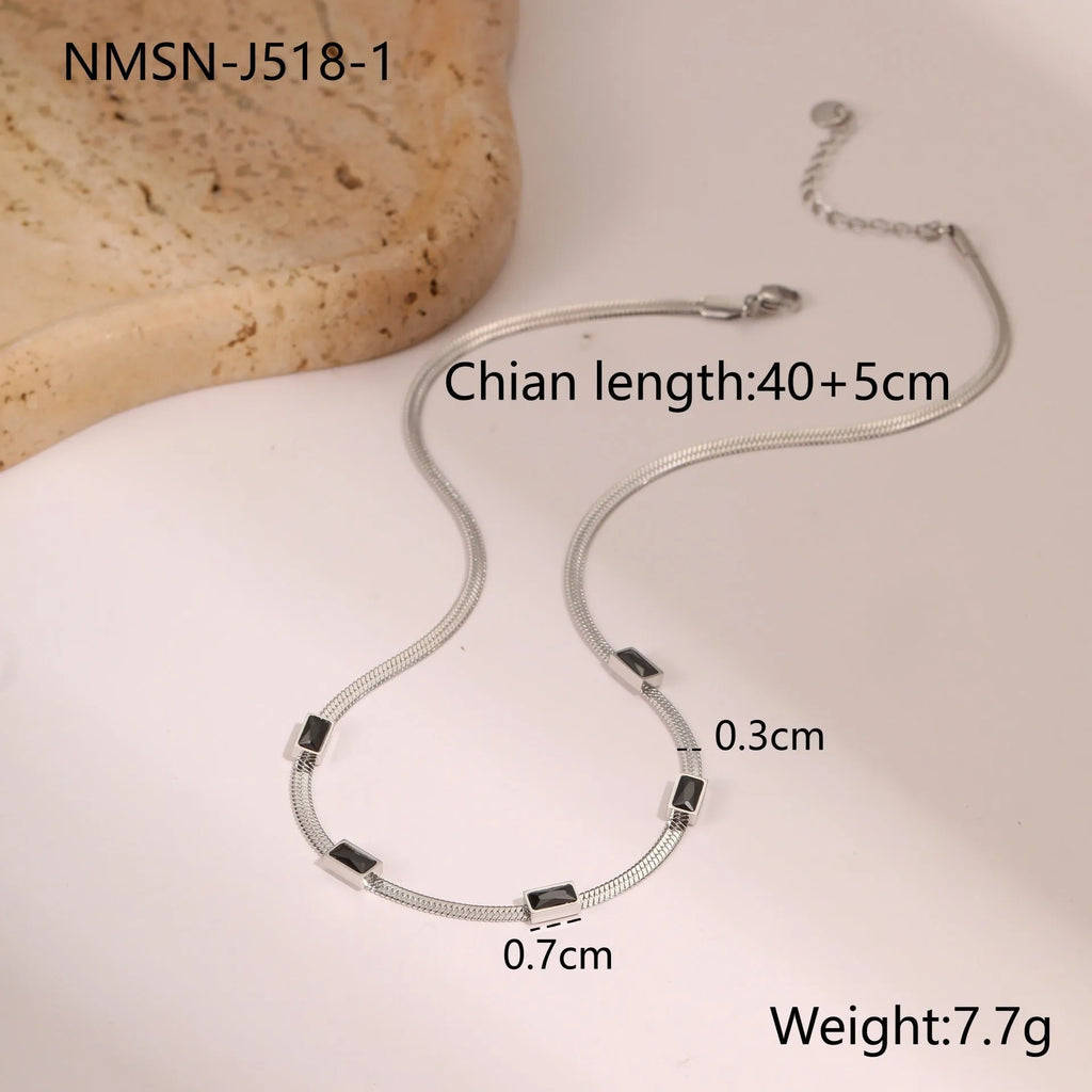 Geometric square zircon necklace on flat snake chain with gold or steel colour electroplated finish