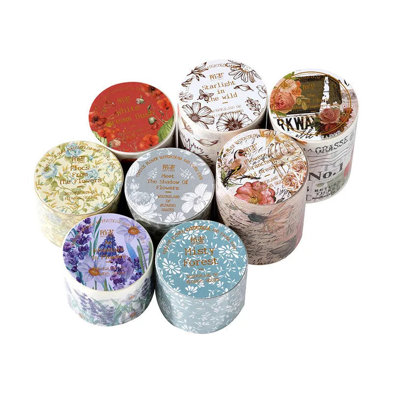 Roll of vintage floral watercolour decorative tape on a Japanese paper base, showing designs like Fog Mountain Forest.