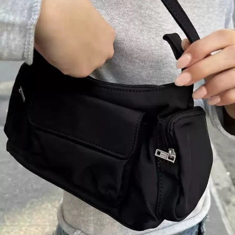 Simple black lightweight nylon shoulder bag with two front pockets