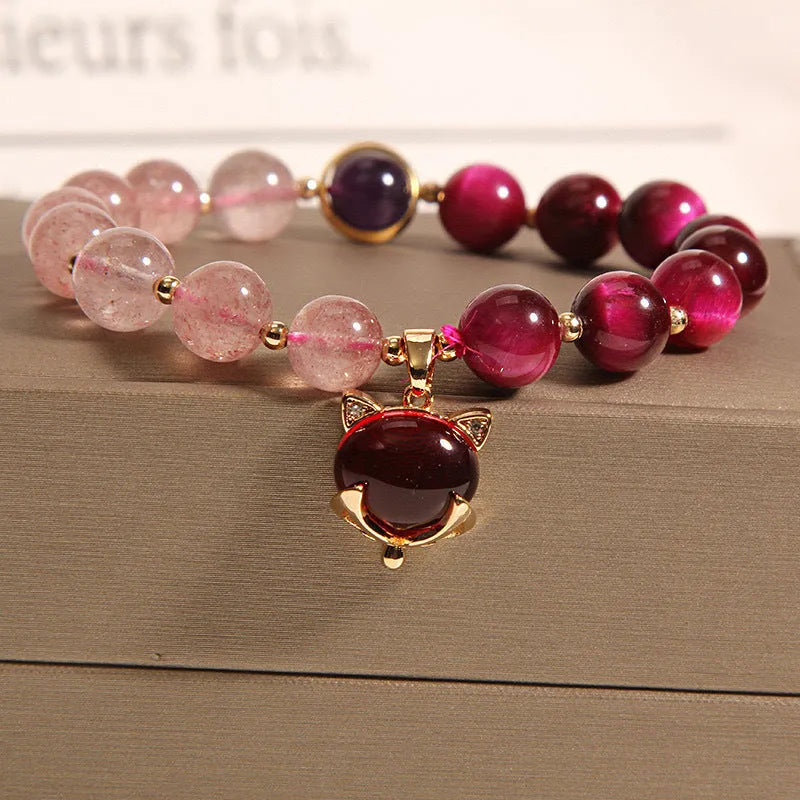 Simple strawberry crystal bracelet for women on a black elastic rope, 18cm long.