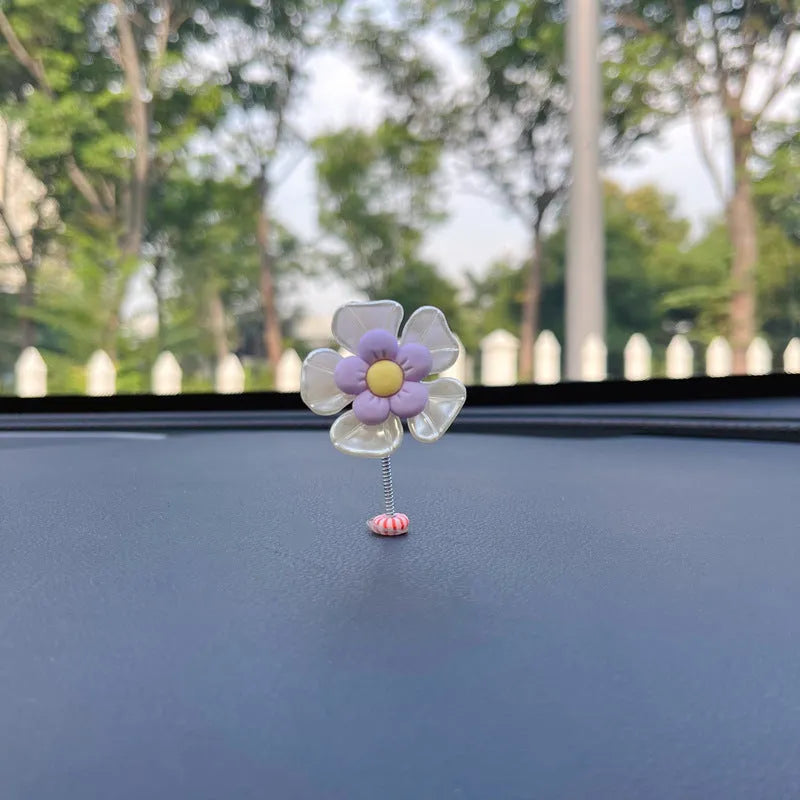 Plastic car swing decoration in choice of five colours measuring 5cm high