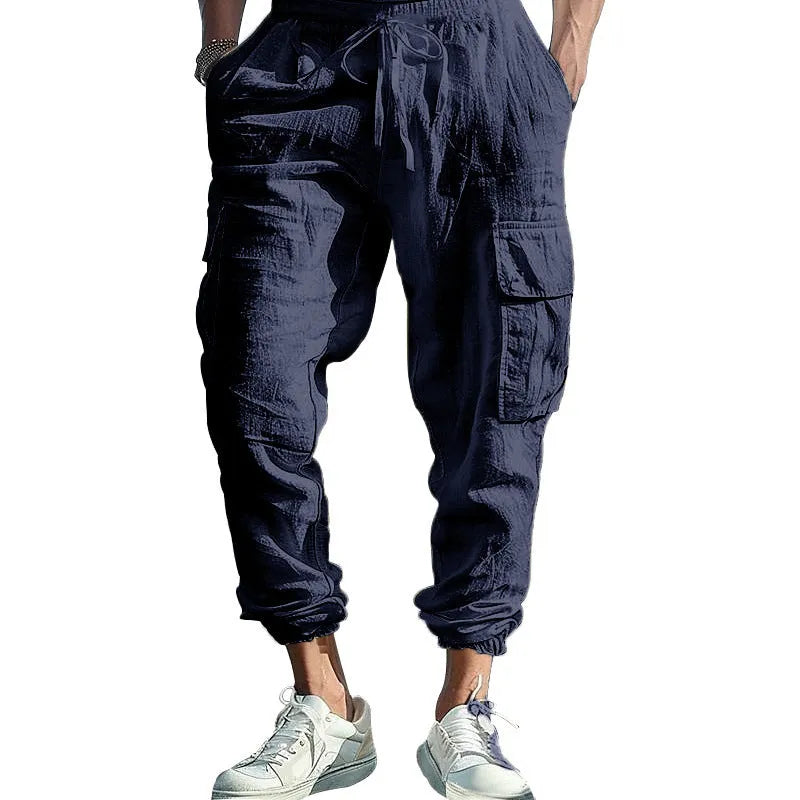 Men's linen casual trousers with ankle-tied cuffs and multiple pockets in loose fit