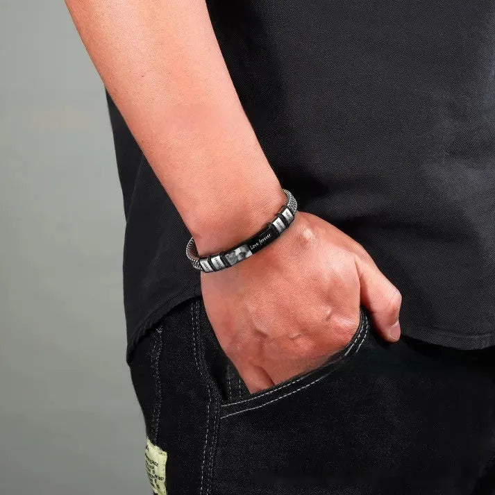 Men's titanium steel and leather rope bracelet with heart shape and bead lettering options in a gift box.