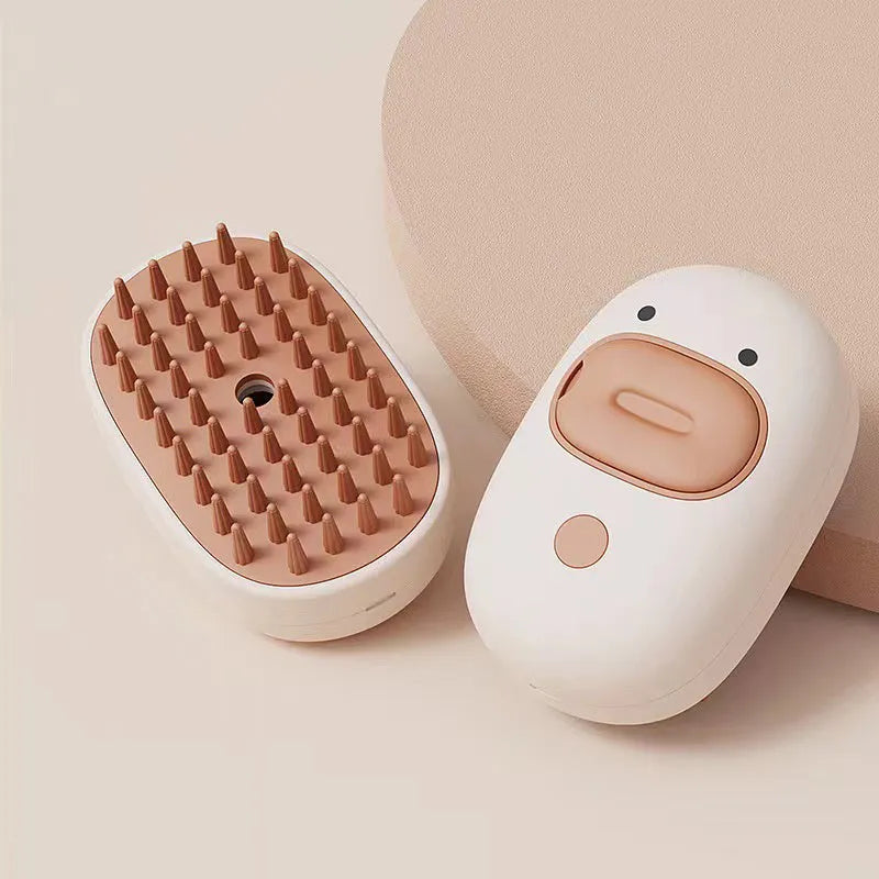 White rechargeable steam pet brush for dogs and cats with rubber comb teeth and water tank