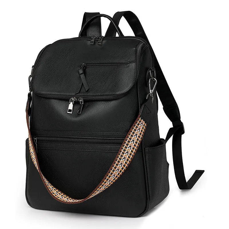Retro college student backpack in PU leather with curved shoulder straps showing stitching detail