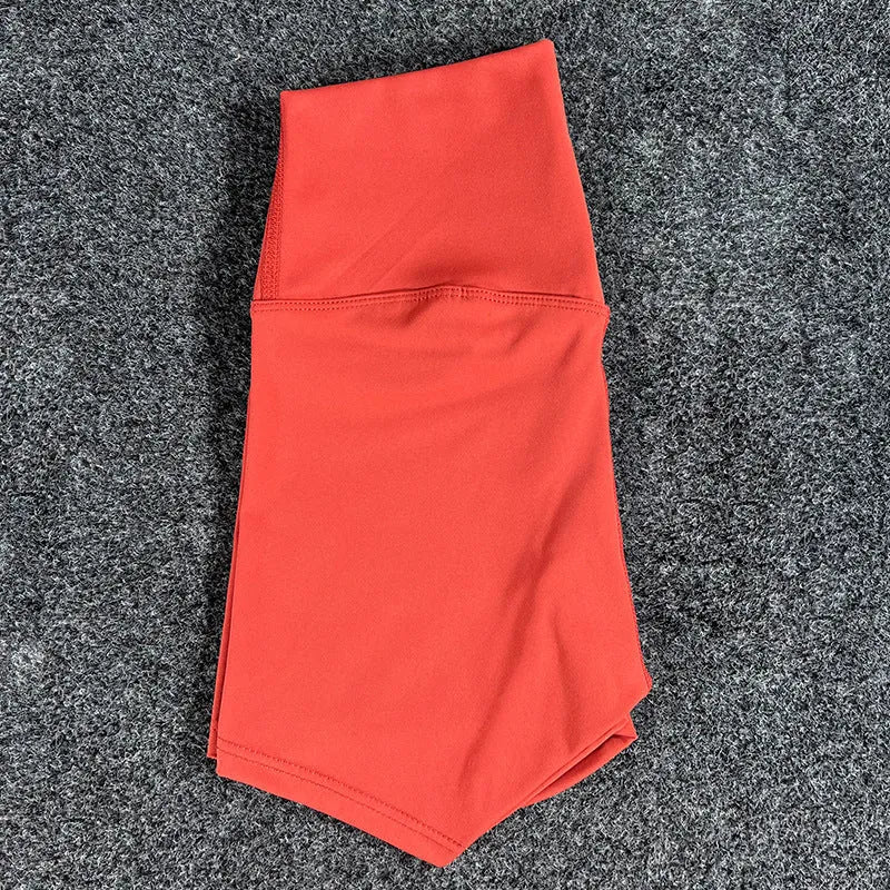 Ladies high-waisted yoga shorts in nylon fabric, shown in one of 16 available colours.