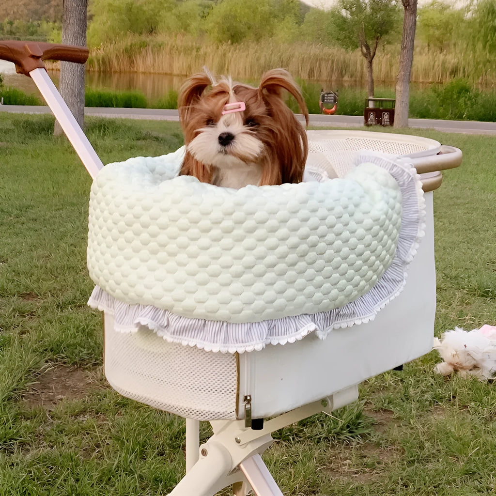 Pet stroller three-piece cushion set with removable cloth towel, pillow and pad in floral pattern.