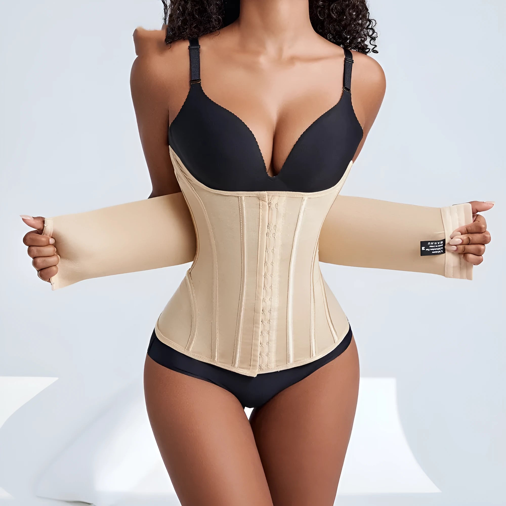 Nylon belly band for waist training in black or apricot colour with belt tie.