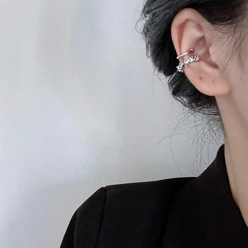 A pair of alloy clip-on earrings with an irregular geometric shape and frosty B4710 colour.