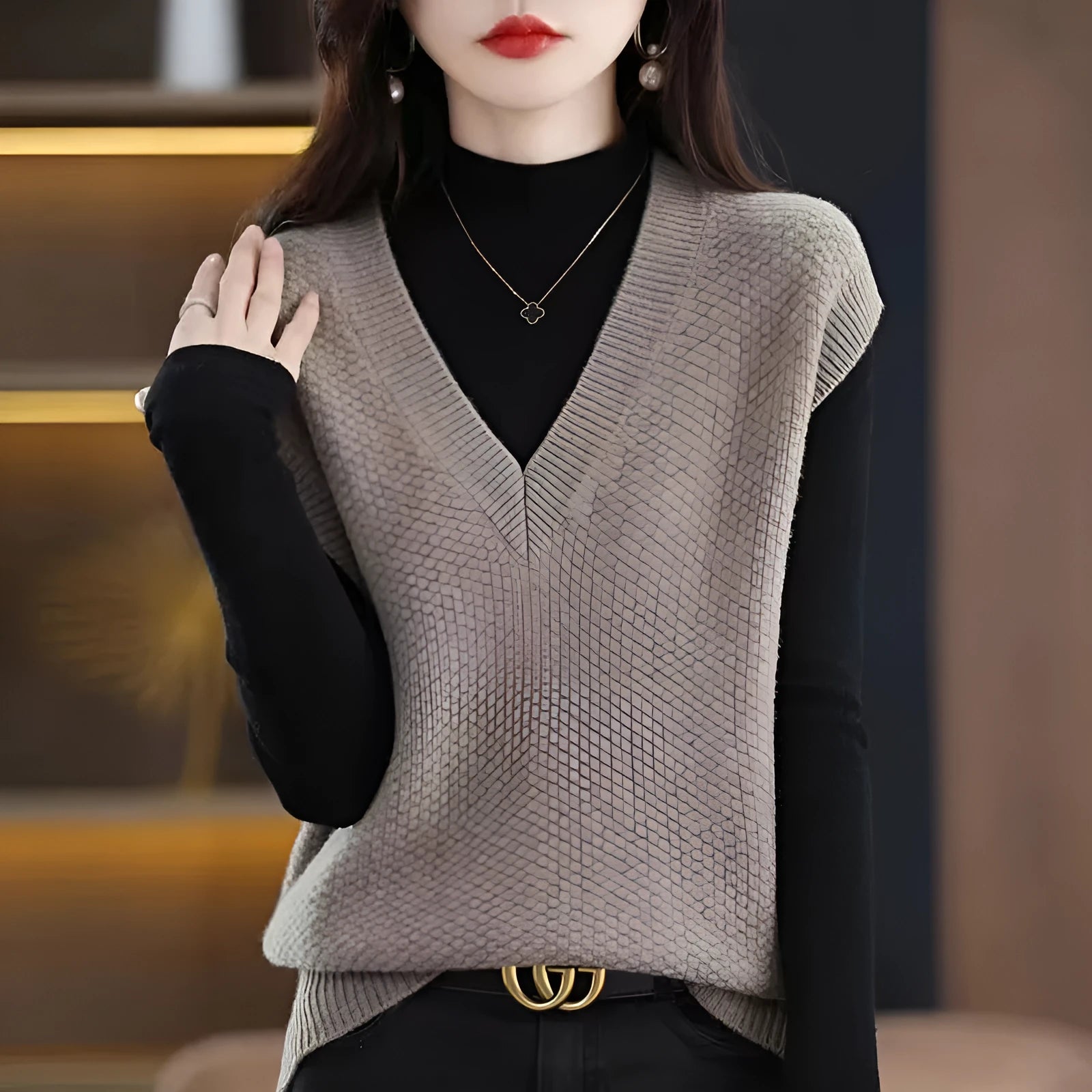 Women's creamy-white V-neck sleeveless vest with 3D knit pattern for commute wear