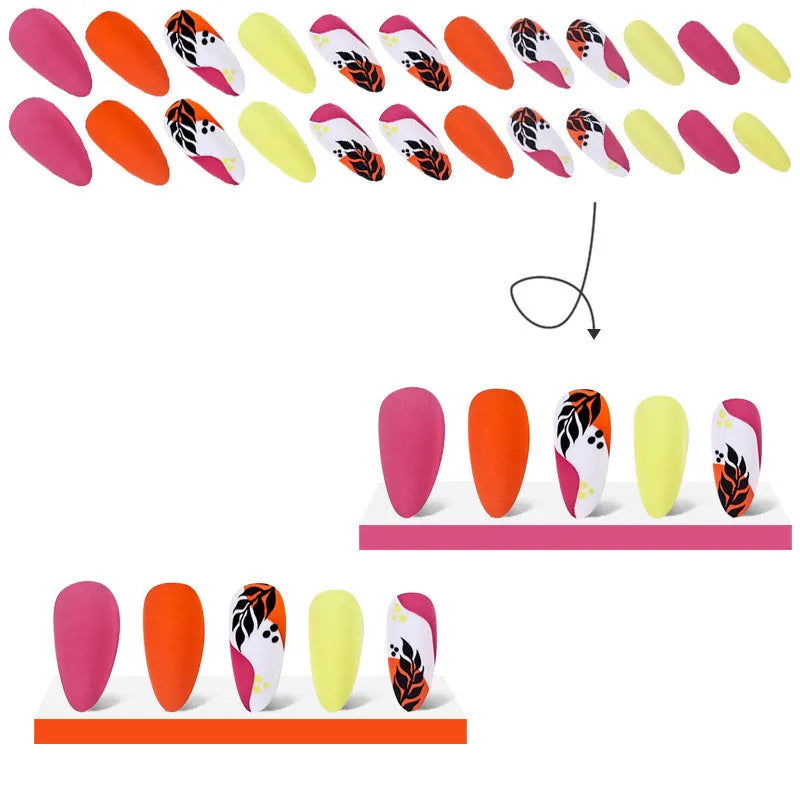 Four boxes of almond-shaped frosted nail stickers showing French leaves, leopard print, macaron and plating designs with tulip pattern
