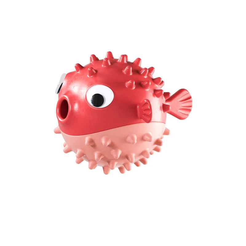 Green fish-shaped dog toy with textured surface for dental cleaning and treat dispensing