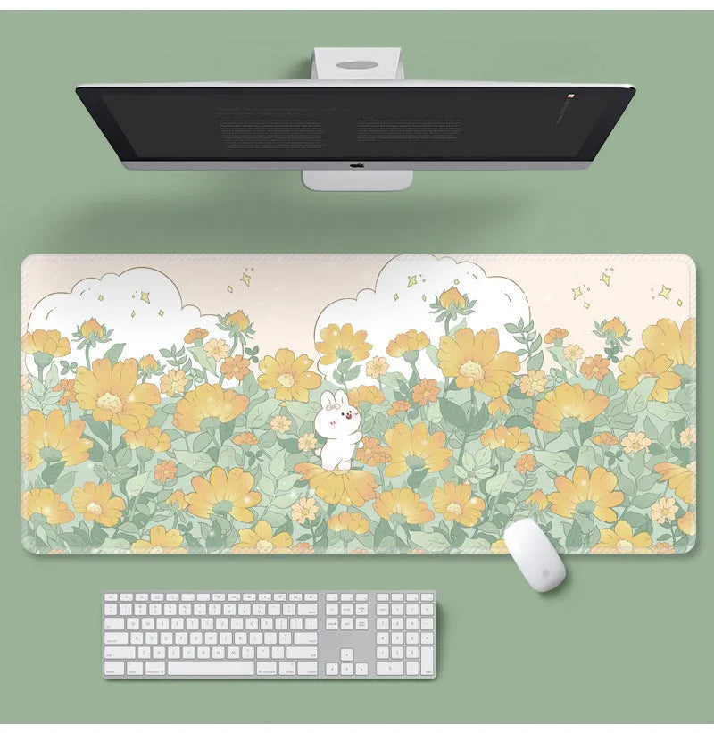Large floral cartoon pattern mouse pad on a desk, showing non-slip rubber base and colourful design.
