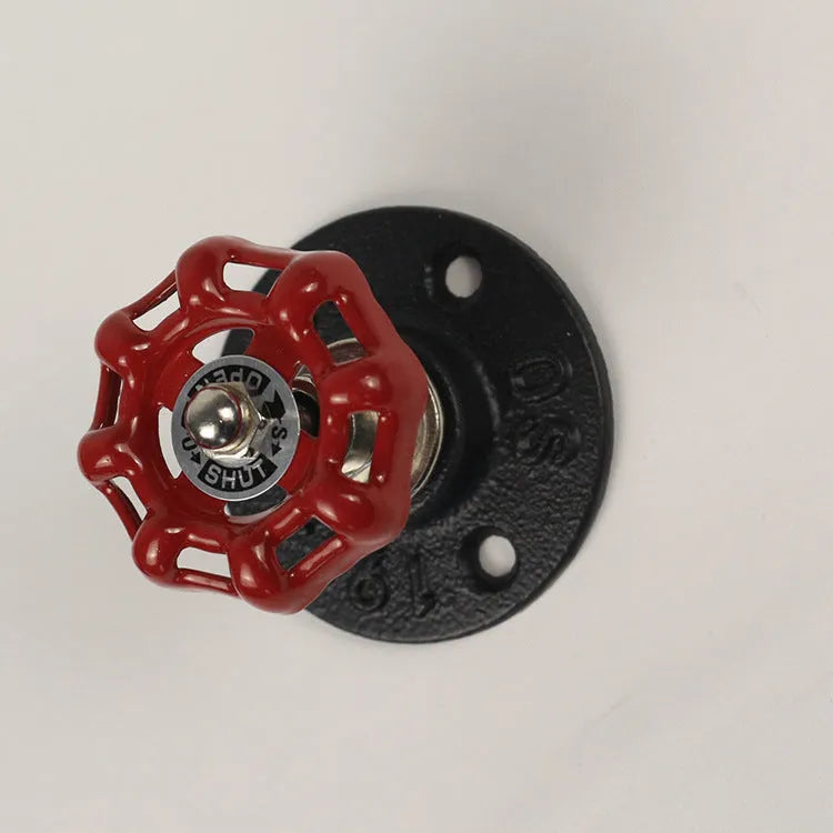 Metal wall hook in water pipe style with polished finish, shown in black, green, and red colour options.