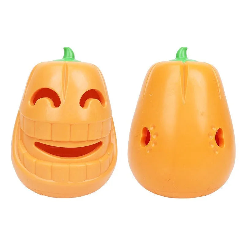 Orange Halloween pumpkin shaped dog chew toy with a treat dispensing funnel.