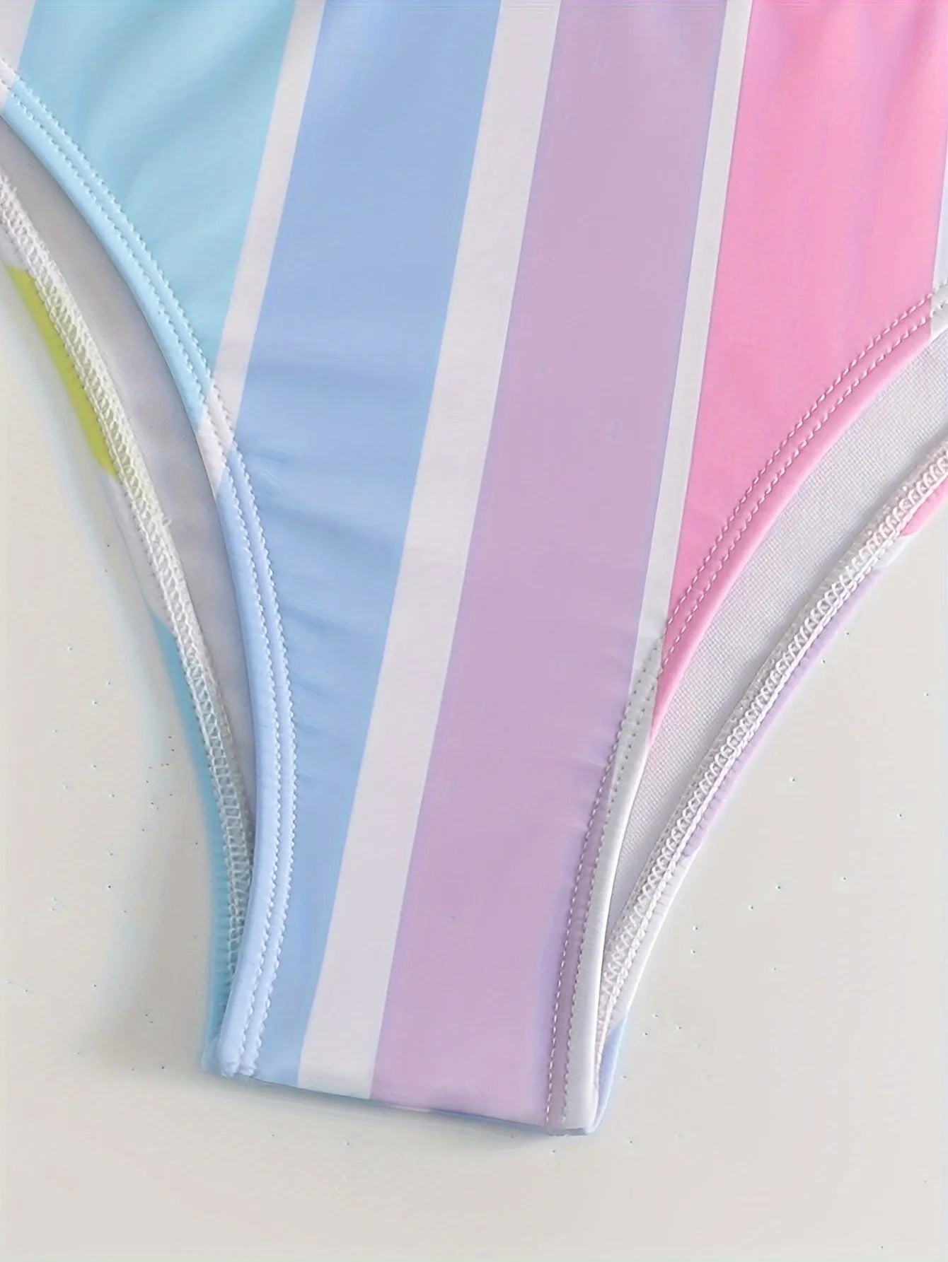 Women's striped sport bikini set with briefs style bottoms and coordinating top