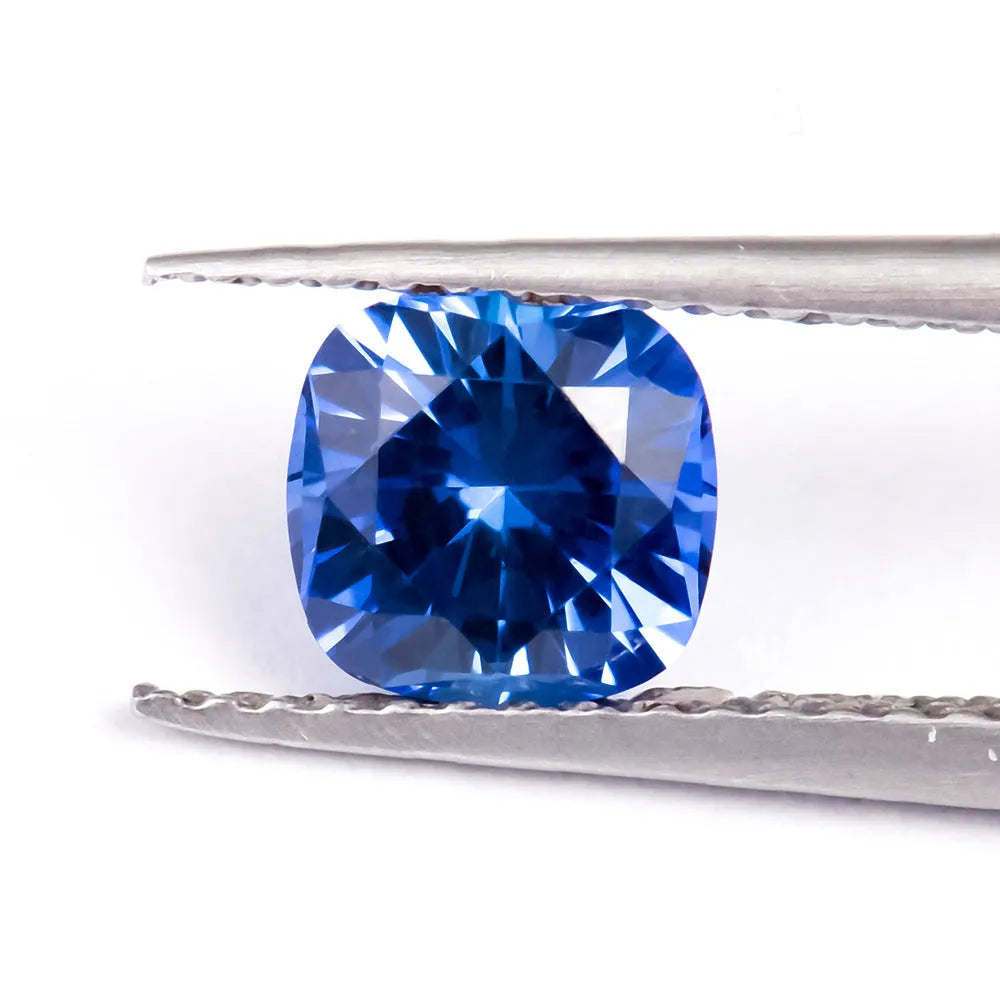Royal blue love shaped tiara gemstones in various weights and shapes including heart, round, and pear styles