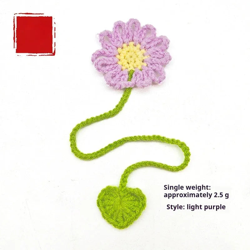 Hand-crocheted wool daisy bookmark with flexible wire core in multiple colour options