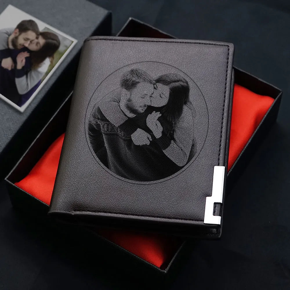 Men's brown leather wallet with a zipper closure, shown individually packaged.