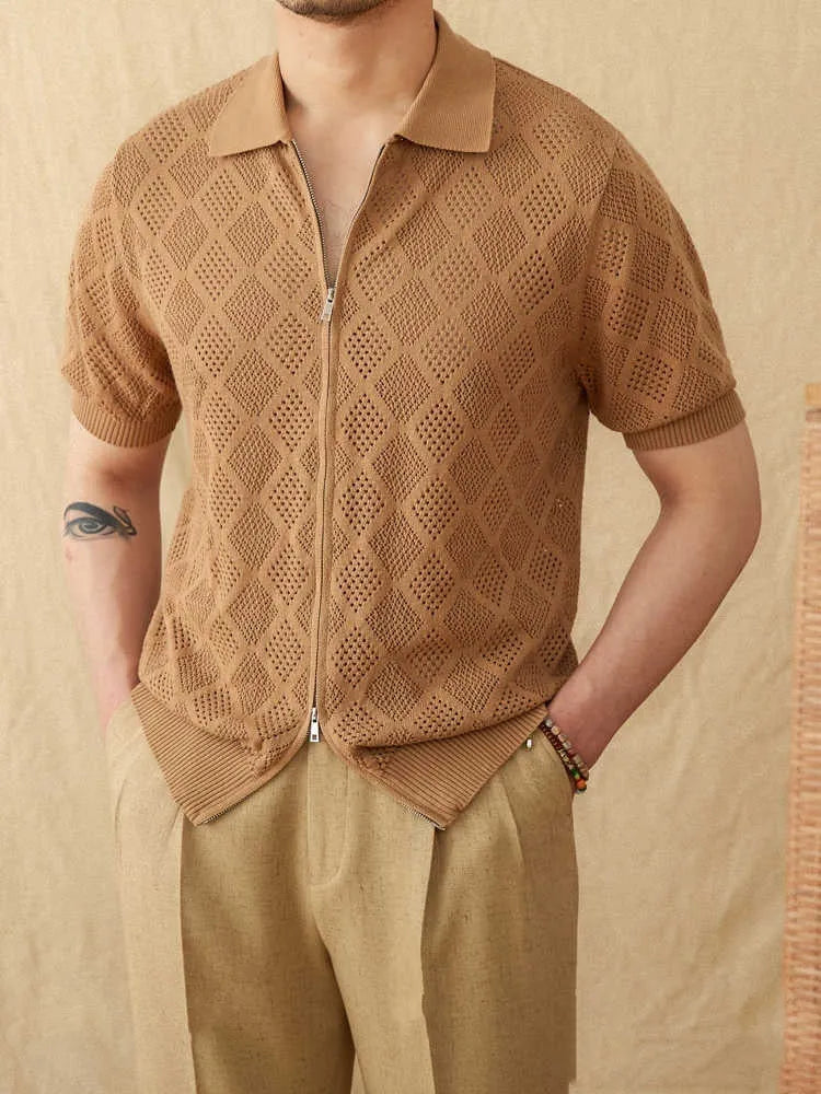 Light brown short sleeve zip-up cardigan with a lapel collar laid flat.