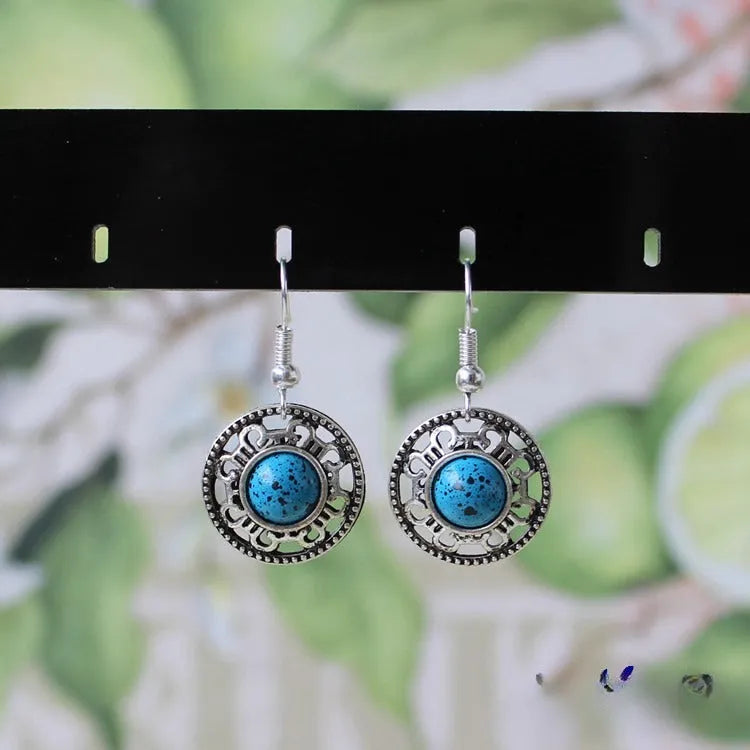 Handmade Miao silver turquoise earrings with geometric flower disk design and ethnic patterns in choice of colours