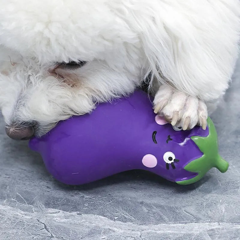 Cartoon onion and eggplant latex dog chew toy for puppies on a white background.