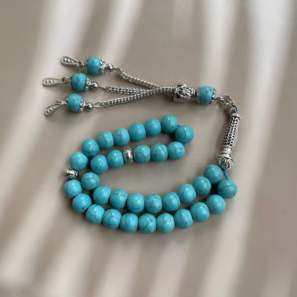 Handmade sky blue stone Muslim worship bracelet with 8mm beads on wrist