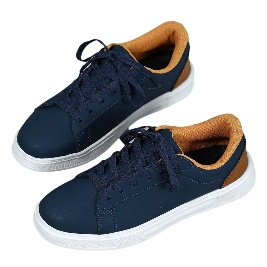 Platform skateboard sneakers in beige brown with cross strap and rubber sole