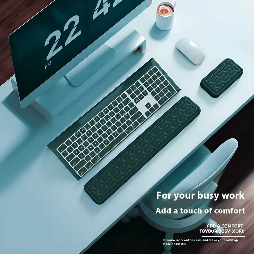 Double-sided ergonomic mouse pad with memory foam wrist rest on a resin base, shown in a solid colour.