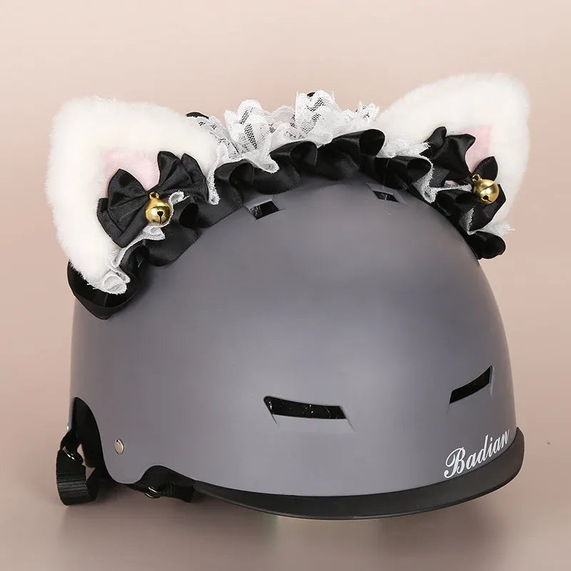 A plush fabric helmet cover with cartoon character ears, shown in size M for bicycle or motorbike use.
