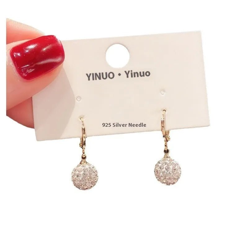 Geometric copper earrings with zircon stones in electroplated finish